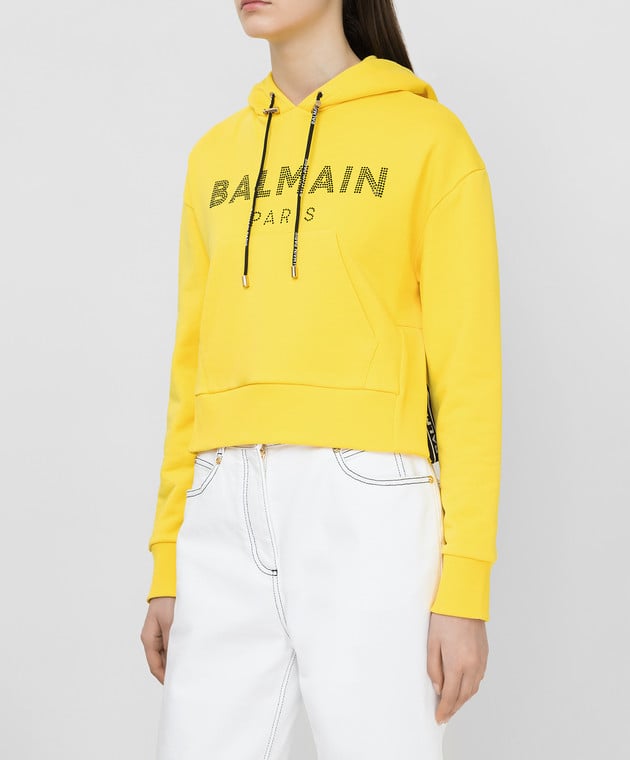 Balmain Yellow hoodie VF13792B010 buy with European delivery at Symbol